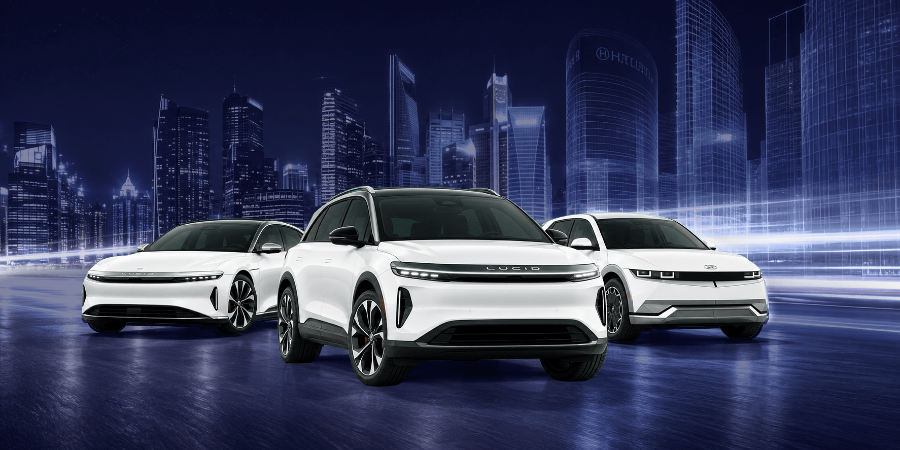 Lucid Air, Lucid Gravity and Hyundai Ioniq 5 in front of a city skyline